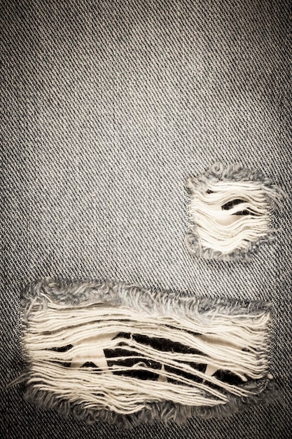 Textura de jeans de mezclilla rasgados vintage.