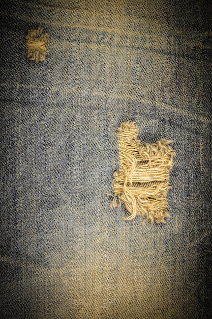 Textura jeans rasgada de jeans vintage.