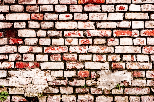 Textura, ladrillo, pared, se puede utilizar como fondo. Textura de ladrillo con arañazos y grietas