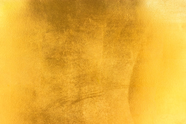 Textura de lámina de oro de hoja amarilla brillante