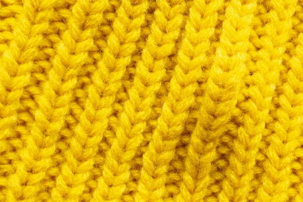 Foto textura de lana de tejer amarillo