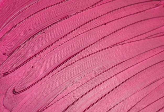 Textura de lápiz labial manchado rojo escarlata Fondo cosmético