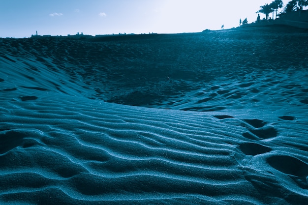 Foto textura de líneas de dunas de arena al atardecer en maspalomas gran canaria emblemático hito en las islas canarias