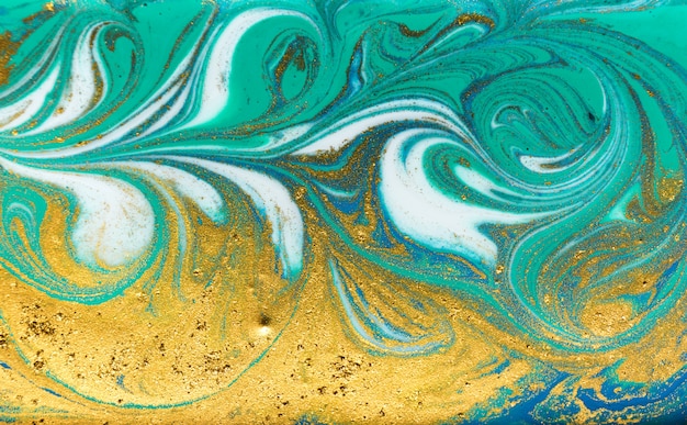 Textura líquida en polvo azul, verde y dorado