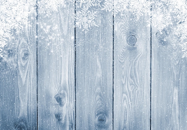 Textura de madera azul con nieve