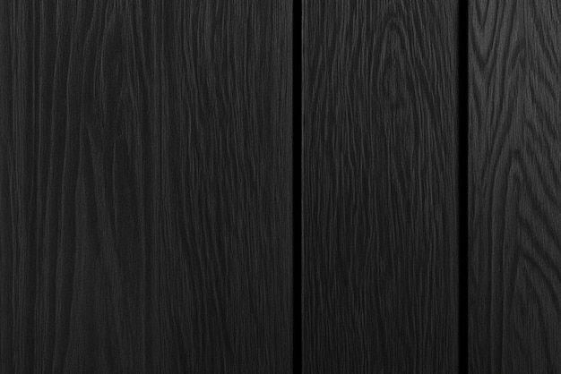 Foto textura de madera de ceniza negra con un ligero brillo que ofrece un aspecto refinado y pulido para el lujo