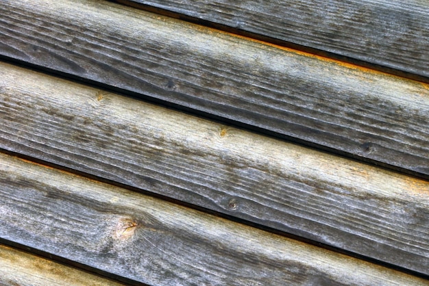 Textura de madera gris de la pared de la casa o valla Fondo de madera