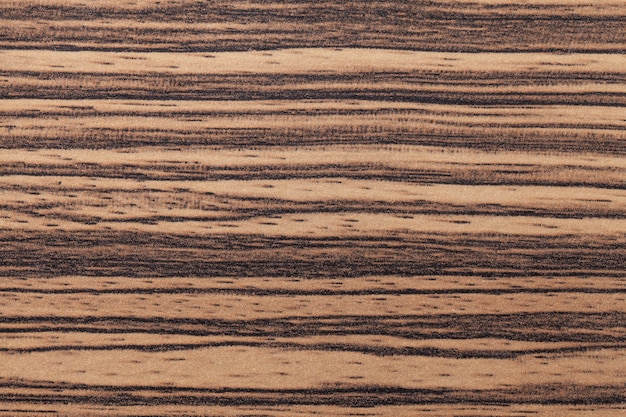 Textura de madera marrón con patrón de rayas negras