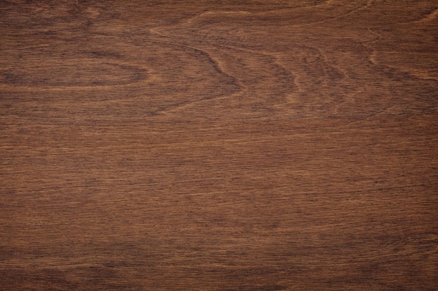 Foto textura de madera oscura para el diseño de muebles mesa o tablero marrón como fondo