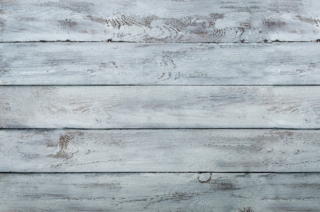 Textura de madera rasguñada blanco, fondo con el espacio de la copia. Bandera