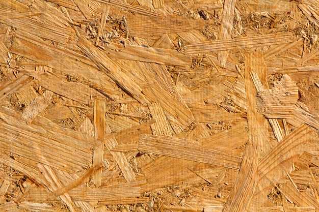 Textura de madera. Tablero prensado de madera OSB de hilo orientado para decoración de fondo