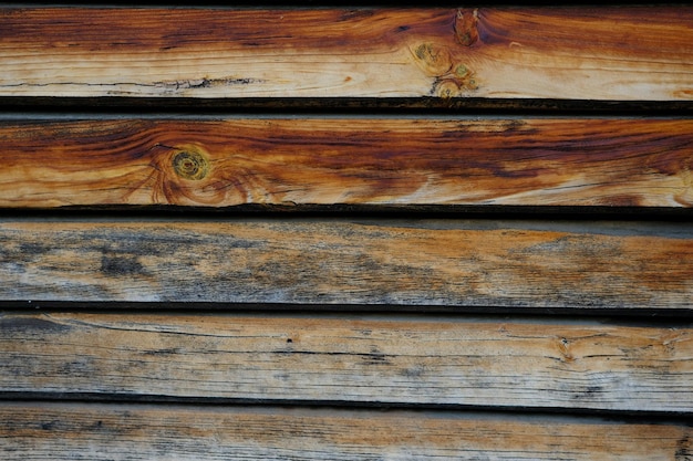 la textura de madera vieja marrón con el nudo