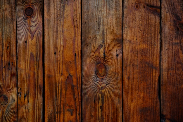 la textura de madera vieja marrón con el nudo