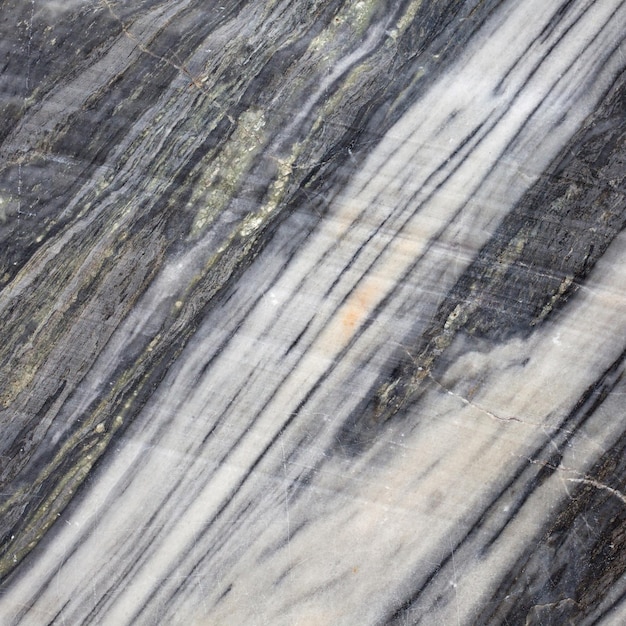 Textura de mármol blanco y negro en una mina a cielo abierto Superficie rugosa de un acantilado minero Plantilla para usar como fondo