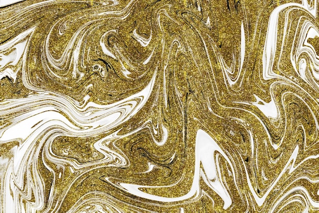 Textura de mármol negro y dorado.