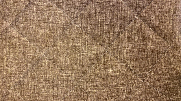 Textura marrom de tecido con costura en quadrado