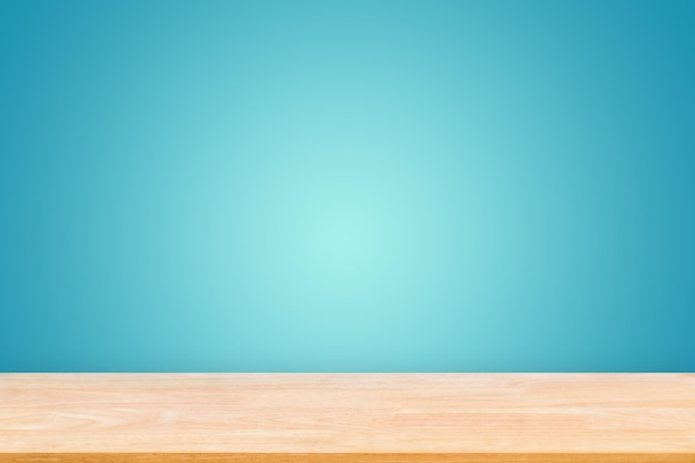Textura de mesa de madera natural abstracta con fondo de pared de degradado azul profundo Vista superior de tablones de madera para diseño de interiores de productos de soporte gráfico o montaje para mostrar su producto