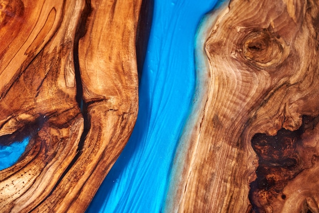 Textura de una mesa de madera con resina epoxi.