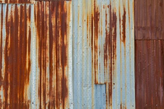 Textura de metal con arañazos y grietas, pared de óxido