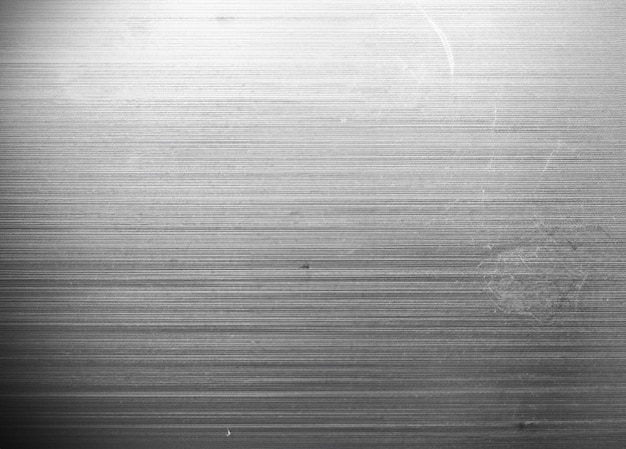 Foto textura de metal con rayones de polvo y grietas.