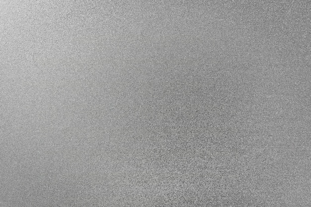 Textura monocromática de metal de grano brillante Fondo abstracto