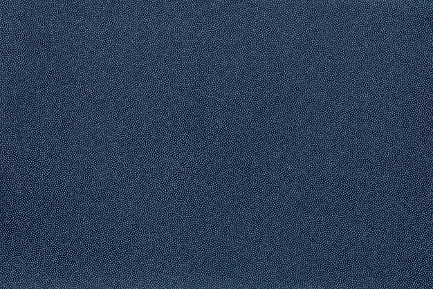 Textura moteada abstracta y fondo de material textil o tela de color azul oscuro