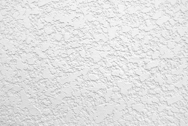 Textura de muro de hormigón blanco áspero para fondo