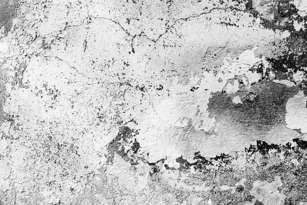 Textura de un muro de hormigón con fondo de grietas y arañazos