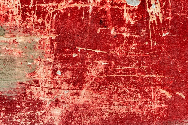 Textura de un muro de hormigón con grietas y arañazos