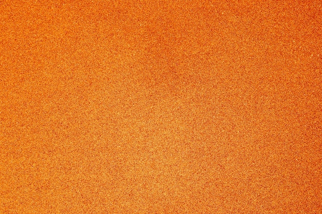 Textura naranja con micro-relieve y purpurina. Fondo naranja con textura