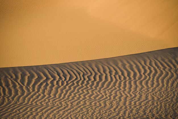 Foto textura natural de la arena en el desierto