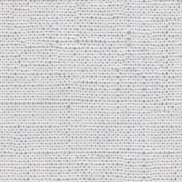 La textura natural del lienzo blanco como parte de su diseño personal