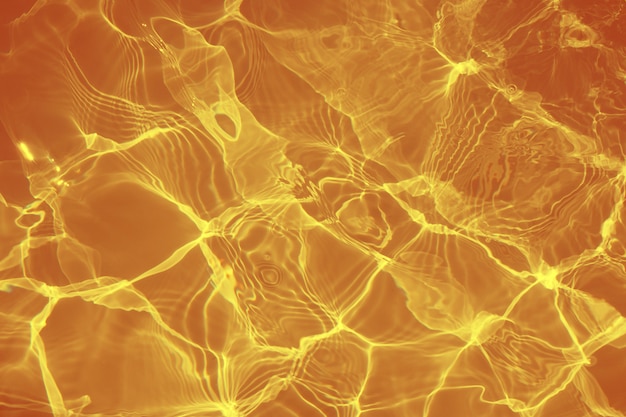 Textura de la naturaleza de la superficie de agua naranja ondulado