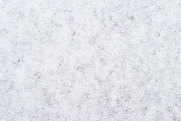 Textura de nieve. Terreno liso cubierto de nieve, fondo de invierno