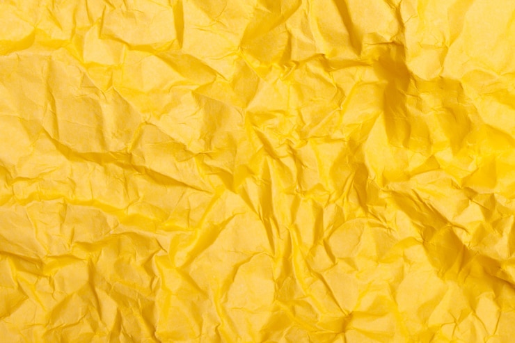 Foto textura o fondo de papel arrugado detallado