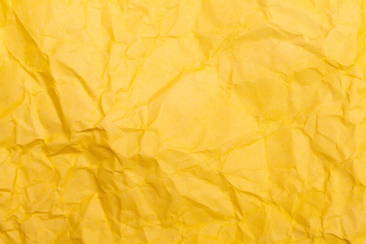 Foto textura o fondo de papel arrugado detallado