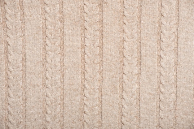 Textura o fondo de punto beige para el concepto de otoño o invierno