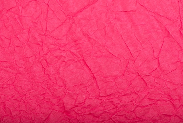 Textura o superficie de papel arrugado rosa