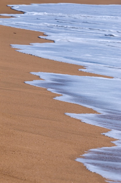 Textura de onda en la arena de la playa