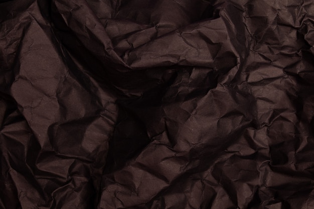 Textura ou fundo de papel amarrotado em tons pretos detalhados