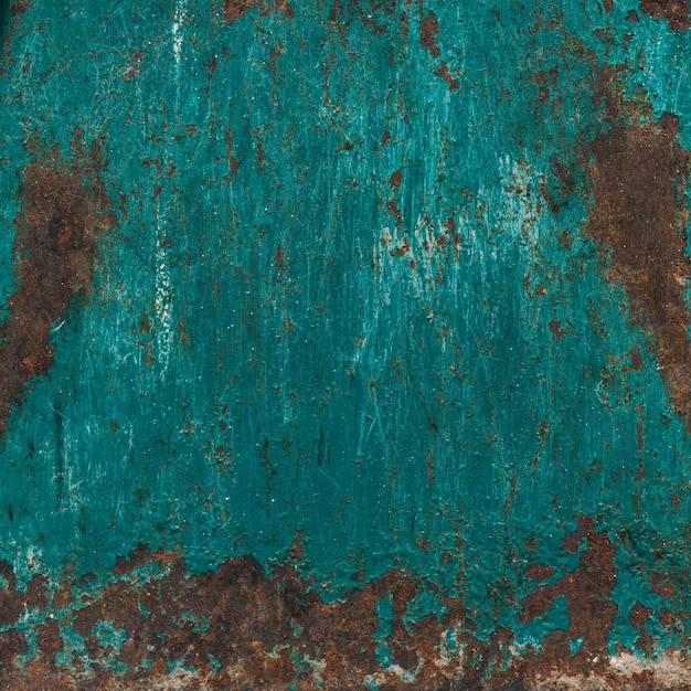 Textura de óxido fondo grunge color marrón azul efecto dañado desigual superficie analógica agrietada arañazo