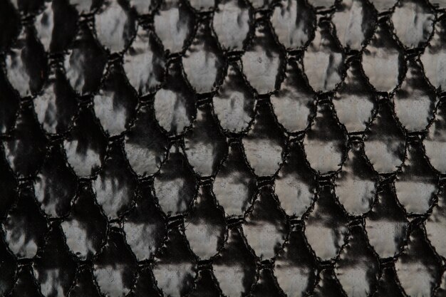 Una textura de un paño de satén negro en una vista de primer plano
