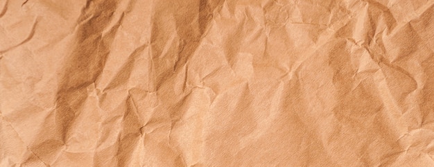 Textura panorámica del viejo papel arrugado amarillo