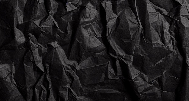 Textura de papel arrugado negro, fondo grunge