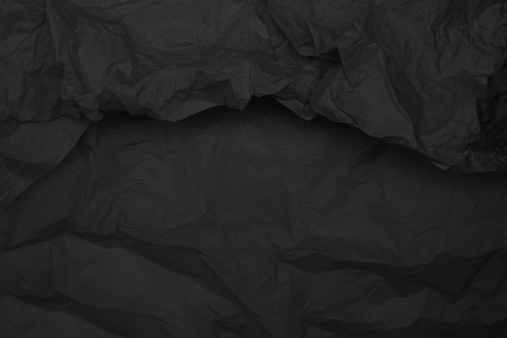 Foto textura de papel arrugado negro, fondo oscuro