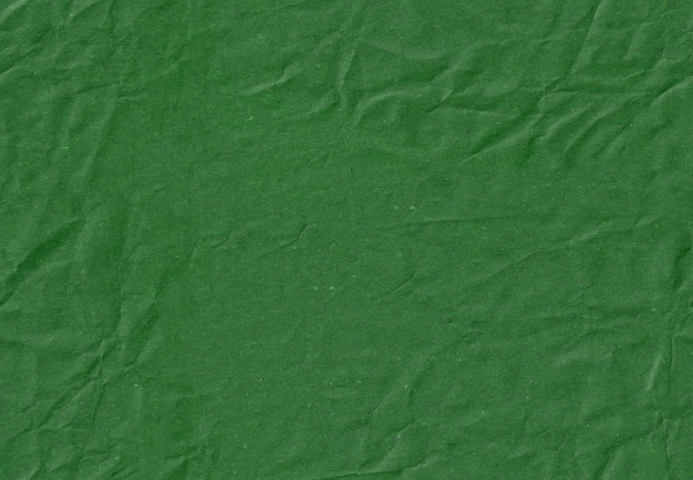 Textura de papel artesanal verde oscuro sin costuras y página beige de reciclaje
