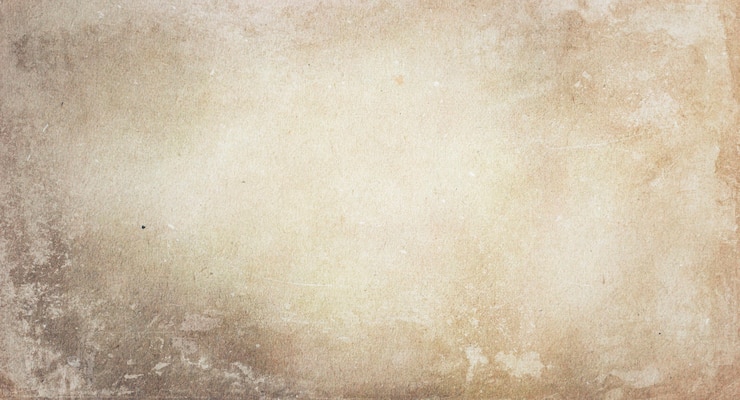 Foto textura de papel beige claro descolorido antiguo con una copia del espacio