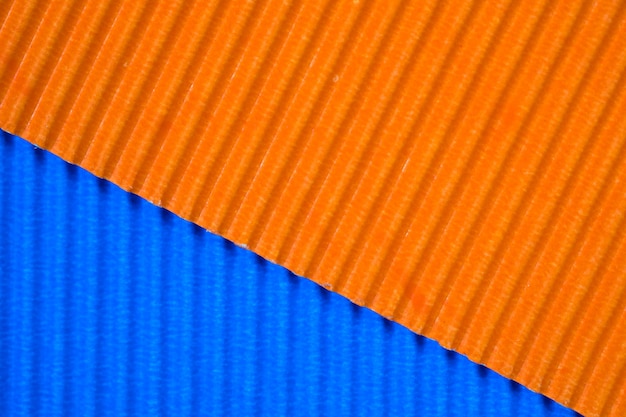 Textura de papel corrugado azul y naranja