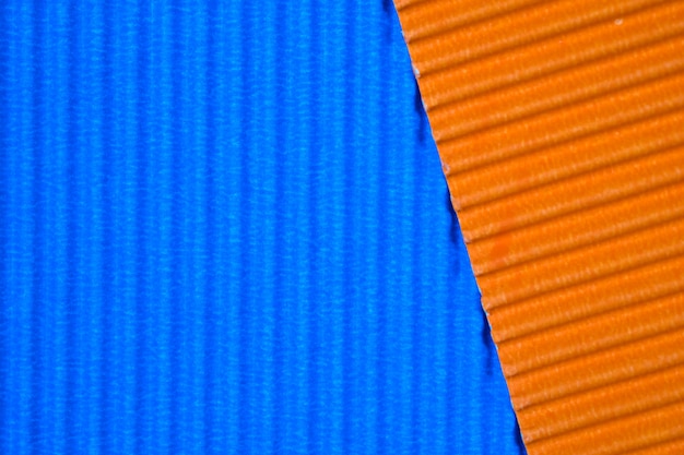 Textura de papel corrugado azul y naranja