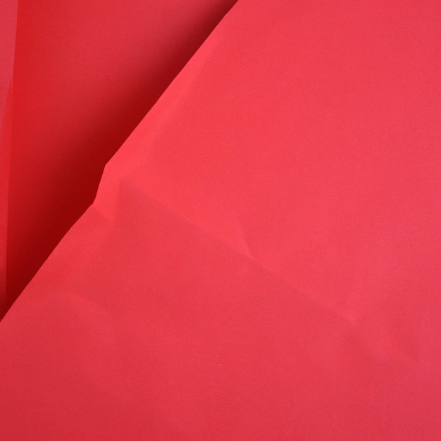 Textura de papel de fondo arrugado rojo Fondo de alta calidad y espacio de copia para texto